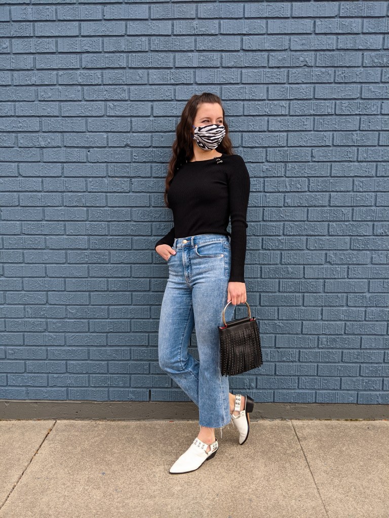 white-mules-black-fringe-purse-blue-jeans