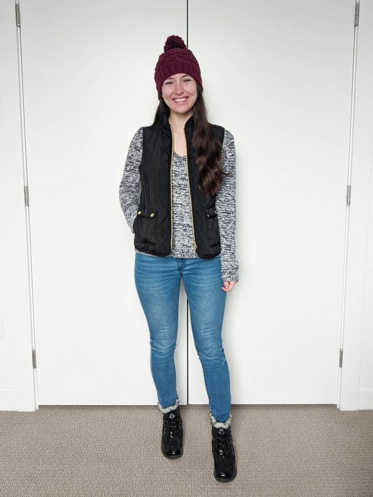vneck-sweater-black-quilted-vest-maroon-beanie-skinny-jeans-snow-boots