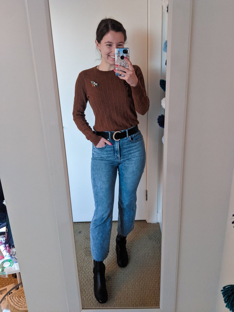 brown-sweater-mom-jeans-brooch-black-boots
