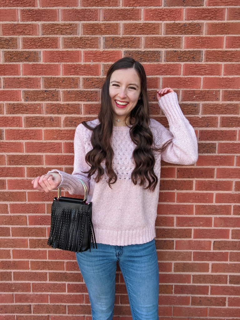 college-creator-linkup-curled-hair-pink-sweater