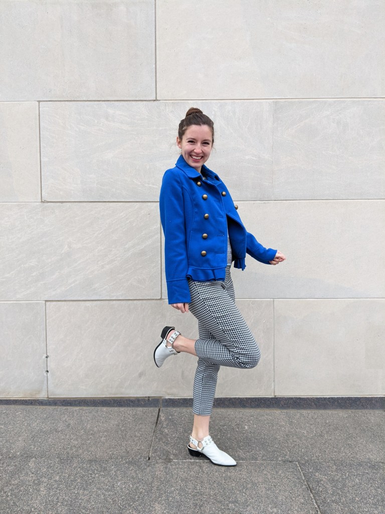 white-mules-houndstooth-pants-blue-coat