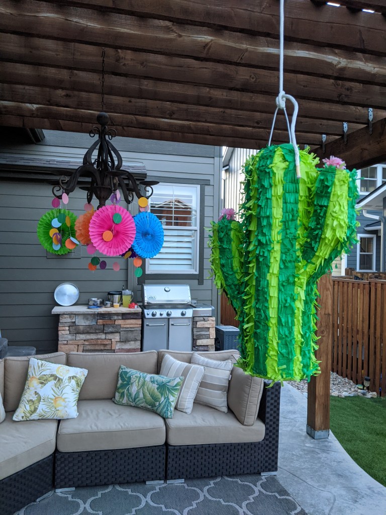 pandemic-birthday-celebration-cactus-pinata-colorful-decorations