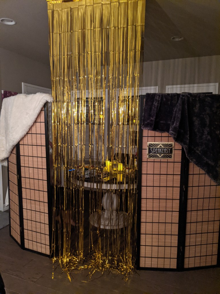 speakeasy-decorations-gold-photo-backdrop-minky-couture-blankets-bar-hopping