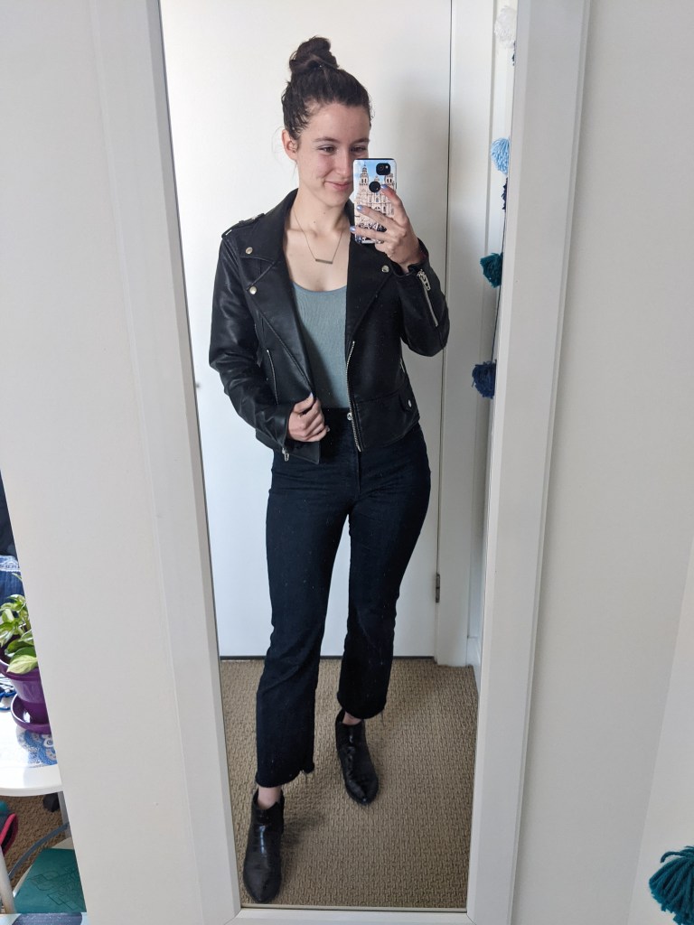 blue-bodysuit-black-leather-jacket-cropped-flared-jeans