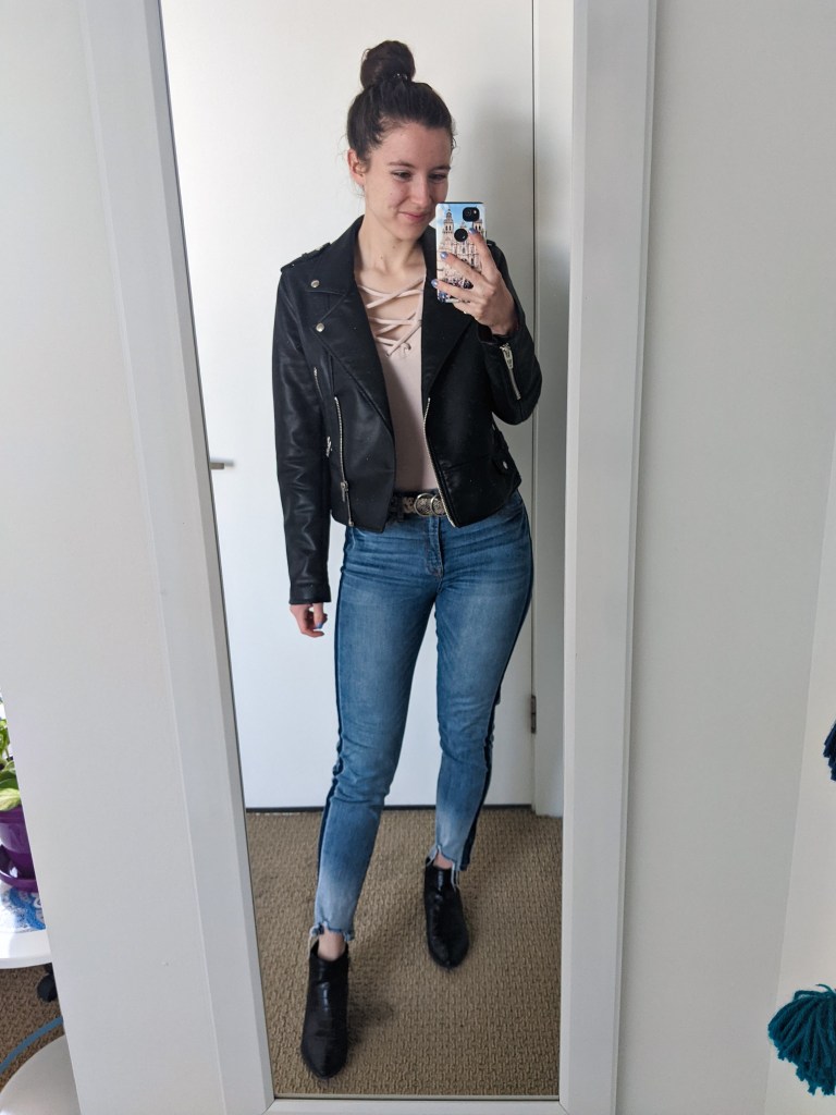 pink-laceup-tee-black-leather-jacket-tuxedo-stripe-jeans-black-booties