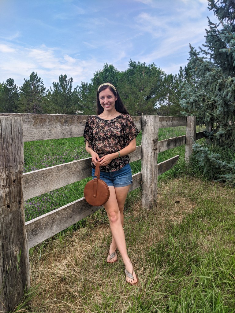 denim-shorts-floral-top-headband-circle-purse