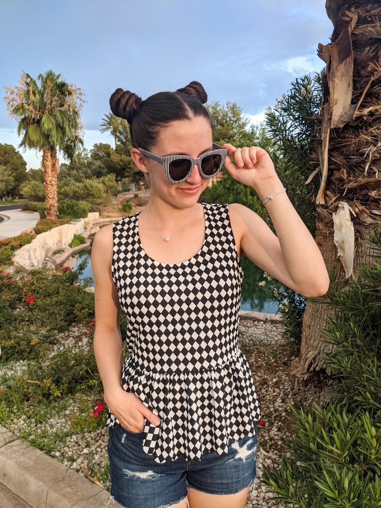 space-buns-striped-sunglasses-checkered-top-peplum