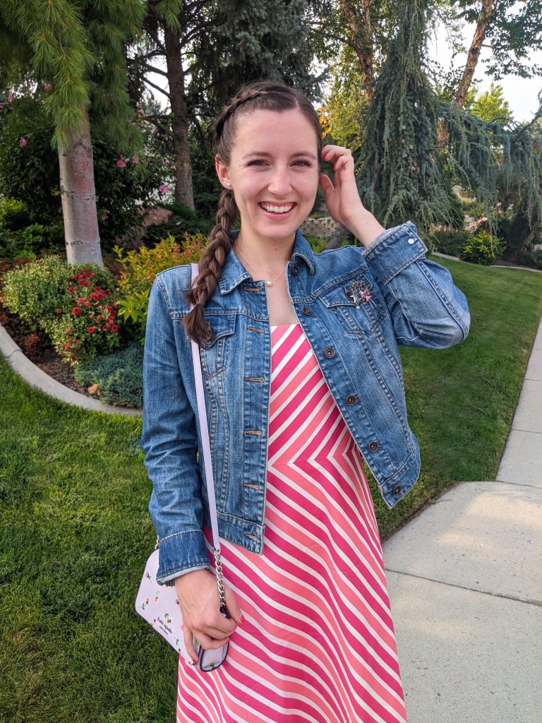 striped-pink-dress-denim-jacket-floral-purse-side-braid