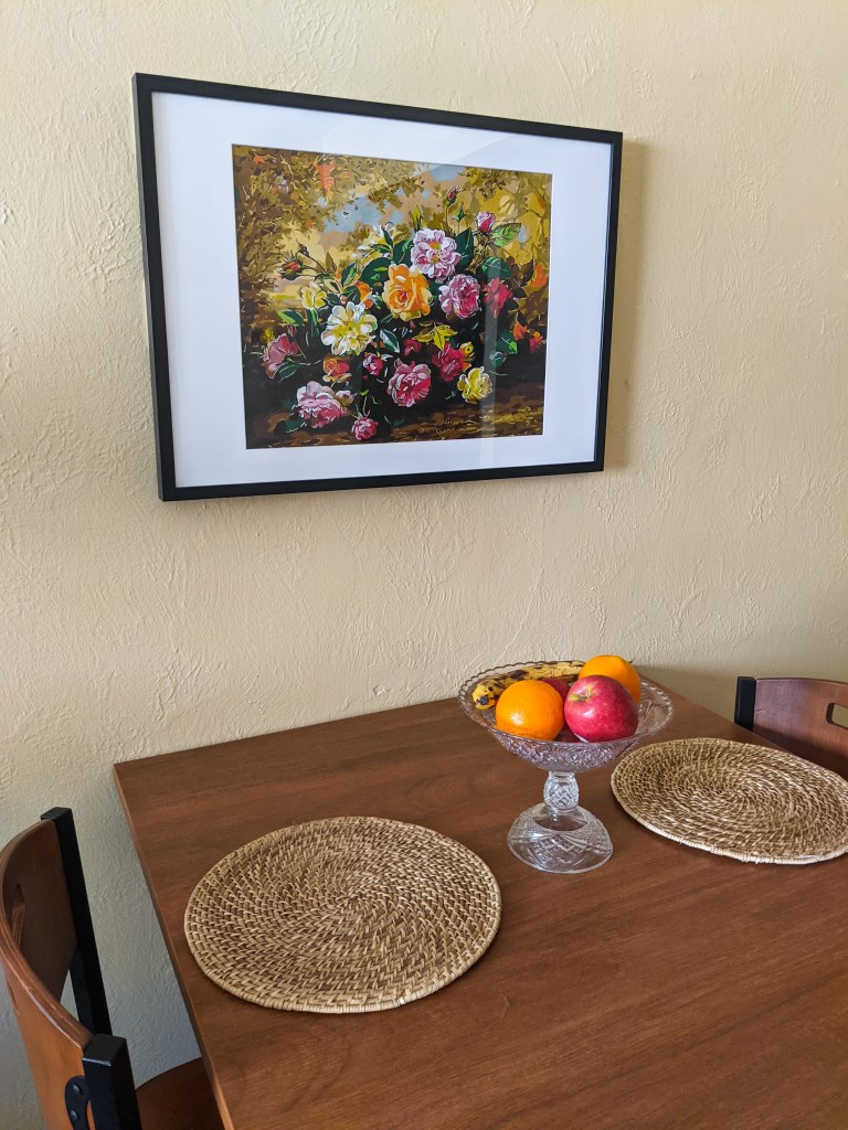 floral-painting-ikea-frame-fruit-bowl-woven-circular-placemats