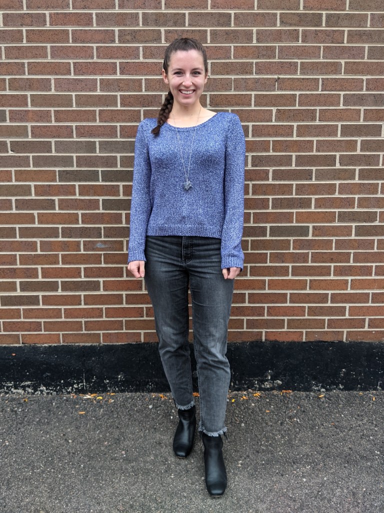 purple-sweater-grey-jeans-french-braid-black-boots