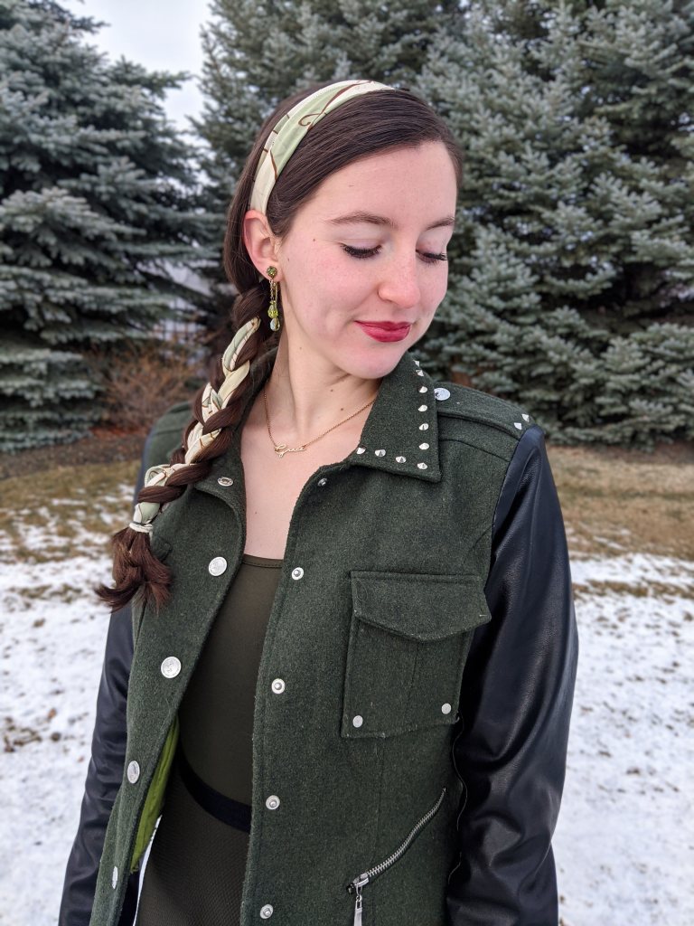 green-hair-scarf-side-braid-maroon-lipstick-studded-collar