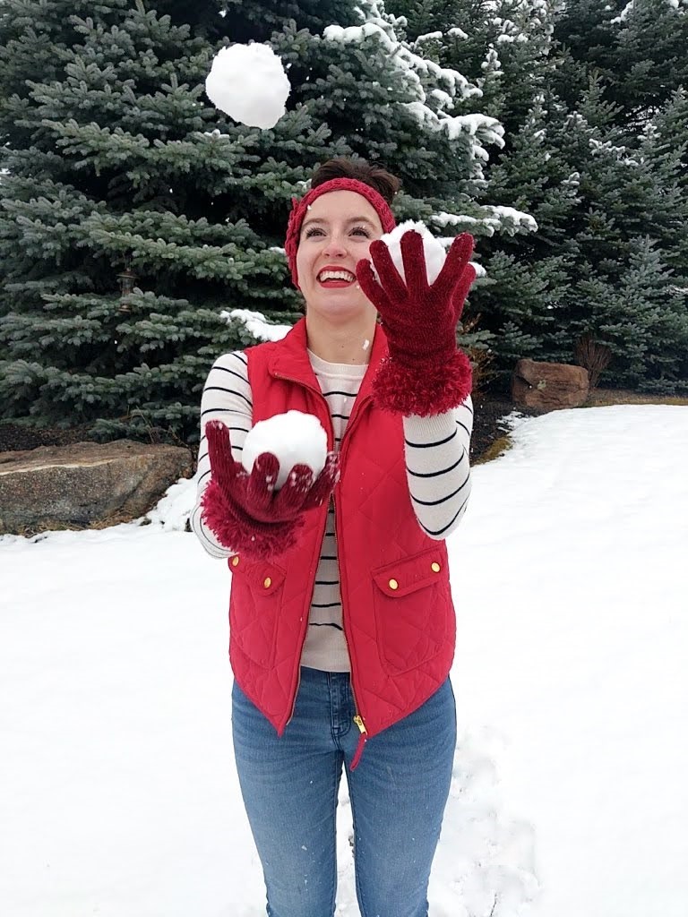 red-vest-gloves-headband-striped-sweater-juggling