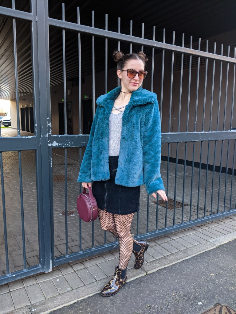 black-corduroy-skirt-fishnet-tights-leopard-rain-boots