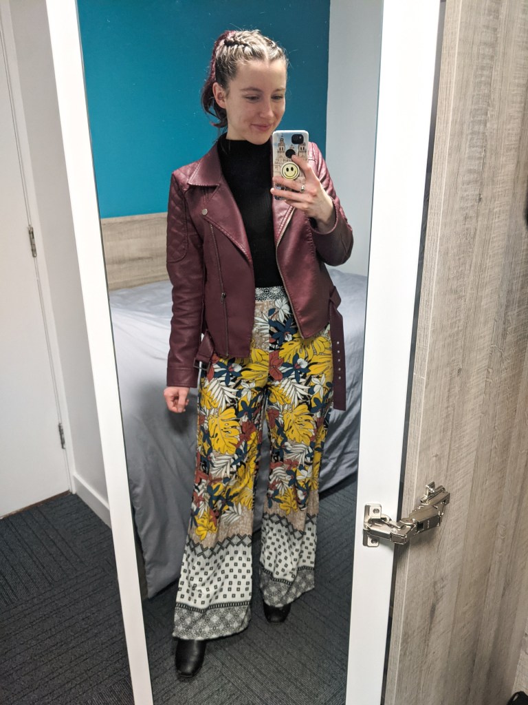 black-mock-neck-top-maroon-moto-jacket-patterned-palazzo-pants