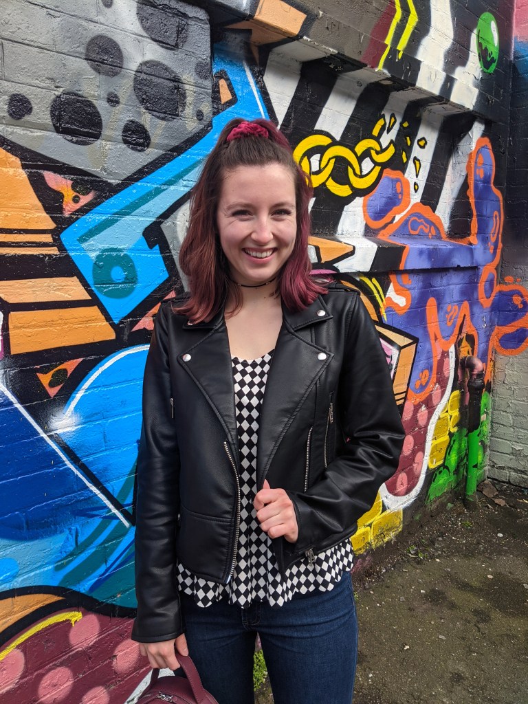 black-leather-jacket-checkered-peplum-top-murals