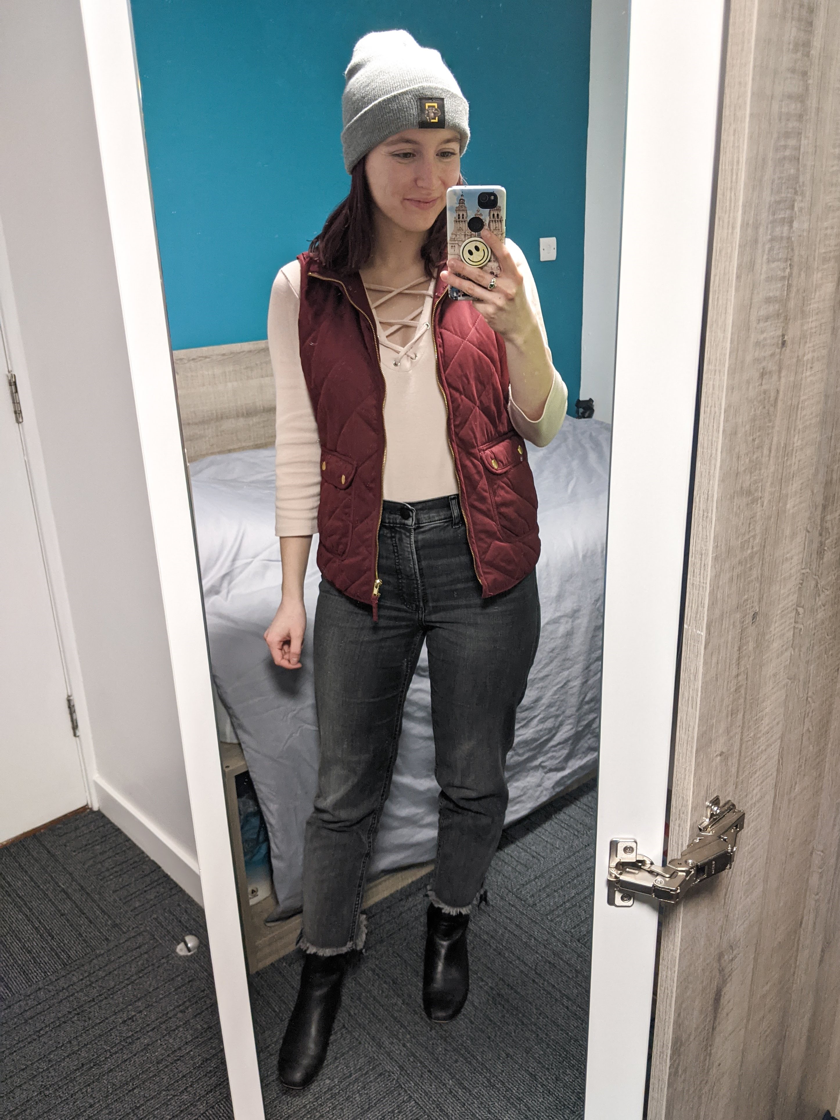 pink-laceup-tee-maroon-quilted-vest-grey-mom-jeans