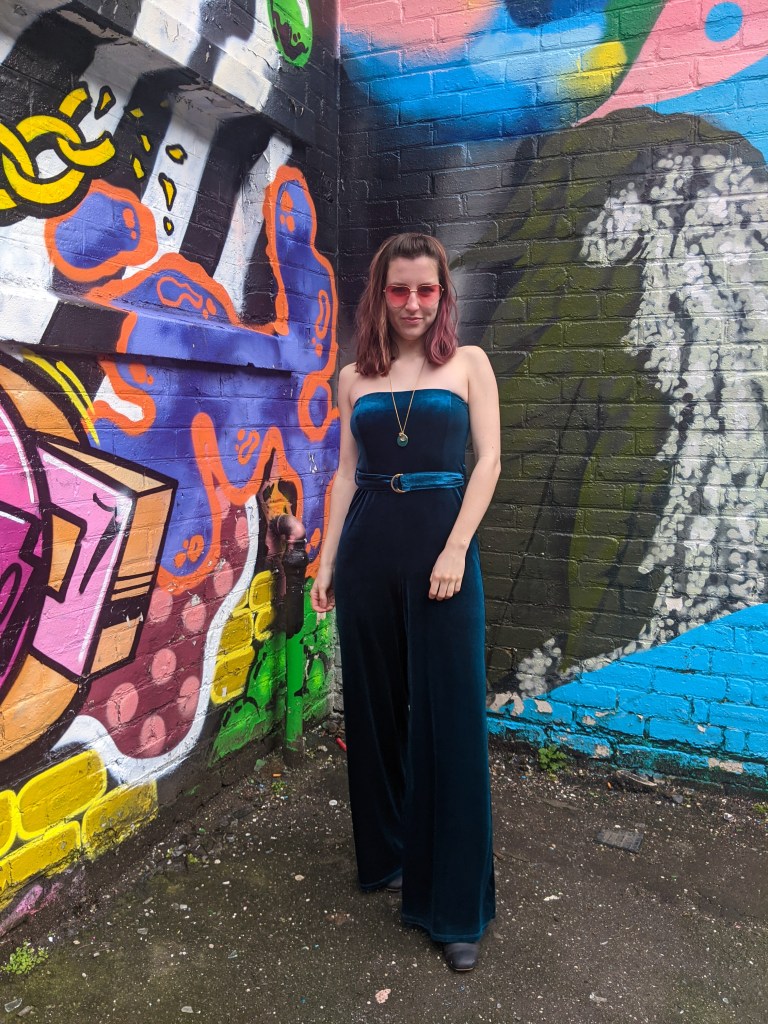 velvet-jumpsuit-teal-heart-sunglasses