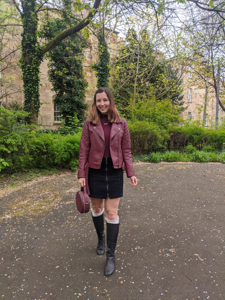 maroon-moto-jacket-black-corduroy-skirt-knee-boots