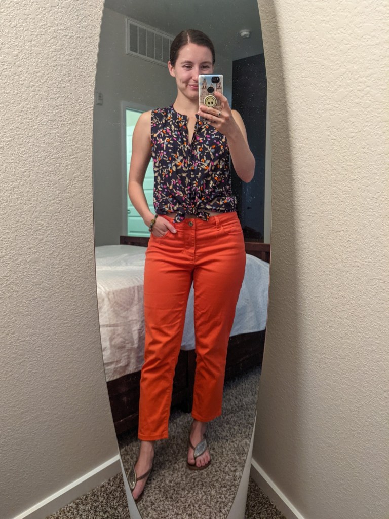 orange-pants-navy-top-complementary-colors-brown-sandals