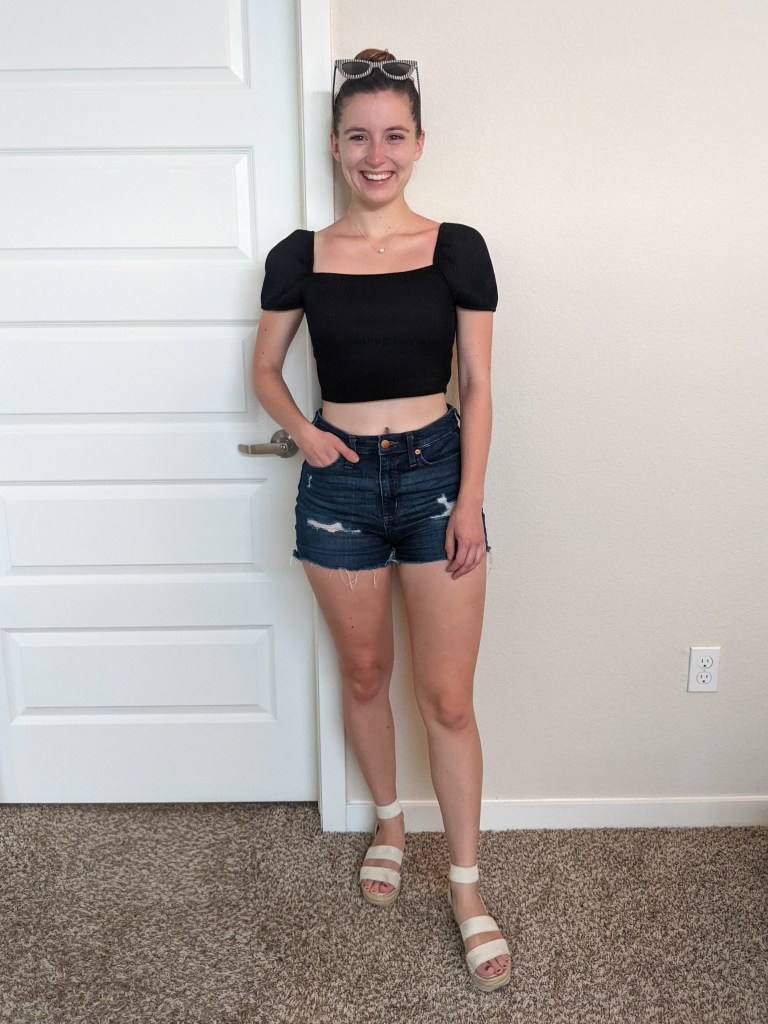 denim-shorts-black-crop-top-puff-sleeves-white-espadrilles