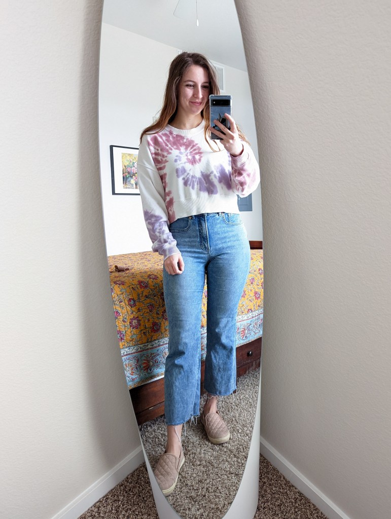 tie-dye-sweatshirt-american-eagle-cropped-flared-jeans-express-steve-madden-sneakers
