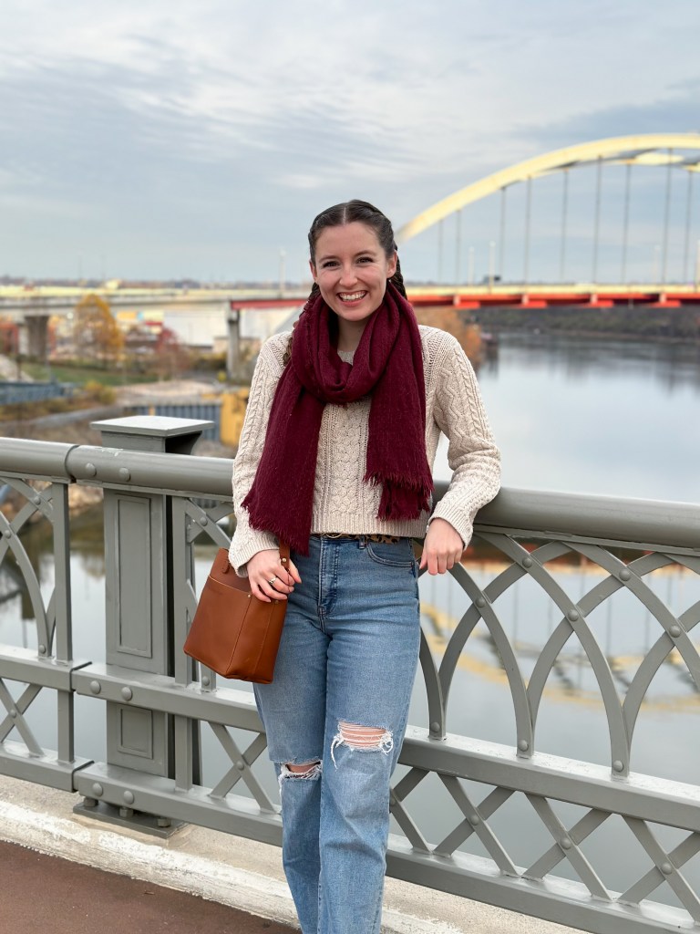 maroon-scarf-beige-sweater-straight-leg-jeans