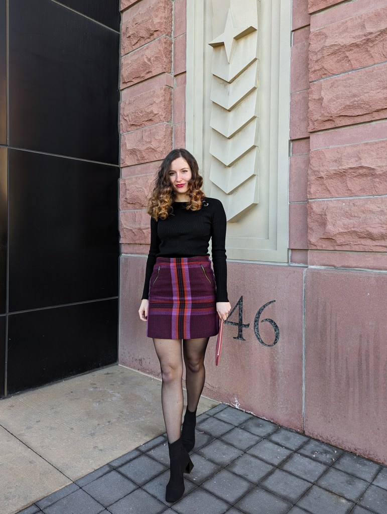 plaid-skirt-sheer-tights-black-ribbed-sweater-black-booties-vivaia-shoes