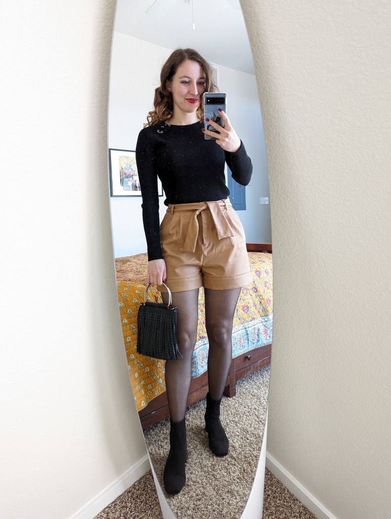 black-ribbed-sweater-brown-leather-shorts-sheer-tights-black-vivaia-booties