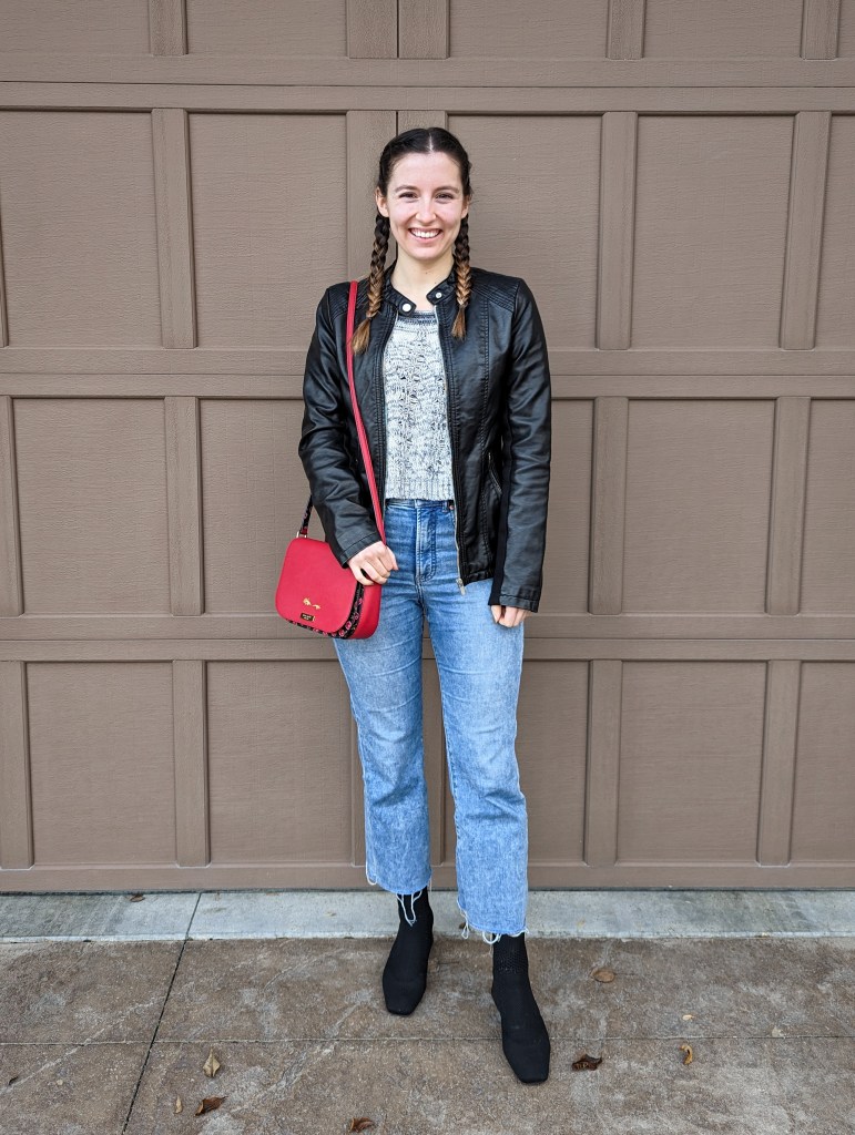 pleather-jacket-red-kate-spade-purse-grey-cropped-sweater-cropped-flared-jeans-black-booties-vivaia