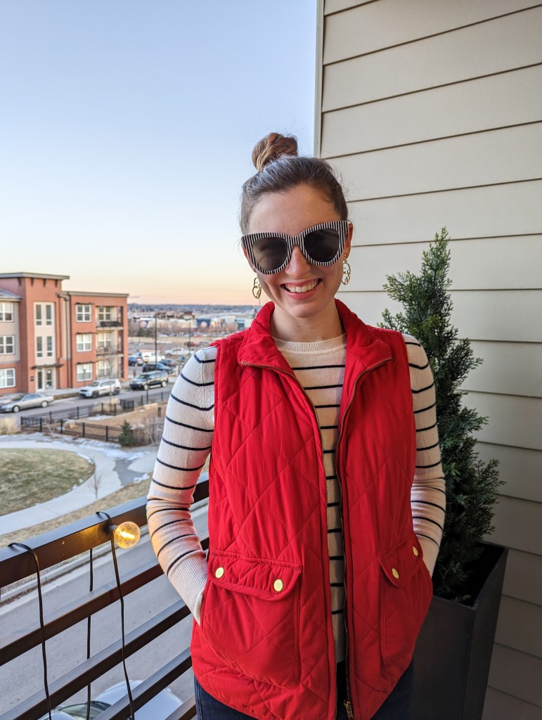 red-vest-striped-sweater-clip-on-earrings-face-striped-sunglasses