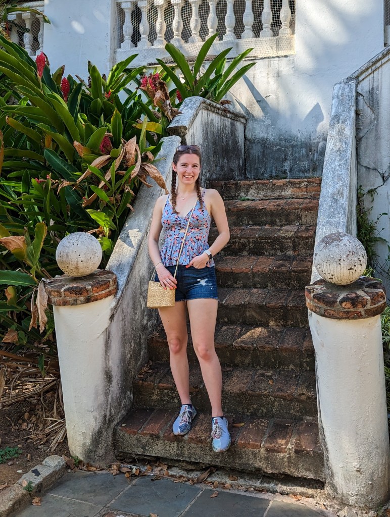 wicker-purse-shoplc-floral-tank-francescas-denim-shorts-uin-footwear-sneakers