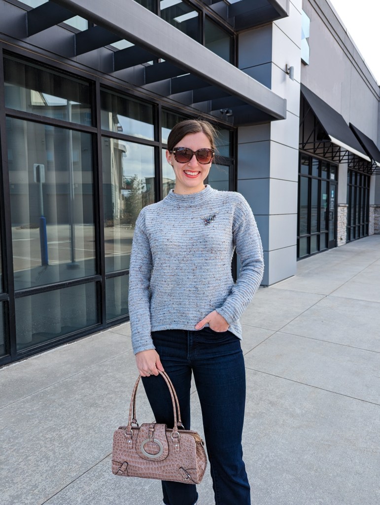 blue-sweater-cropped-flared-jeans-patent-leather-purse-sundance