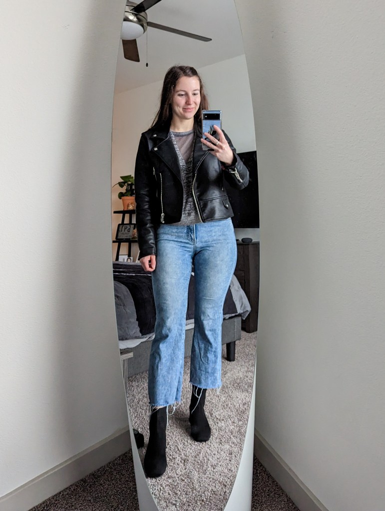 cropped-flared-jeans-black-booties-vivaia-leather-jacket-grey-sweatshirt