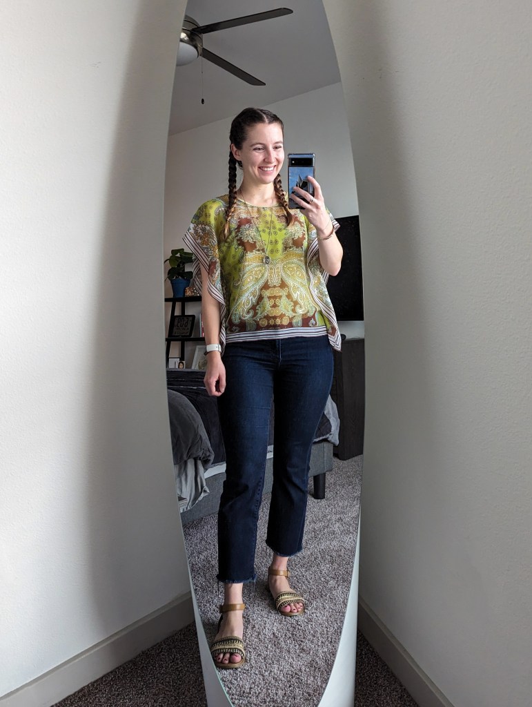 green-boho-blouse-cropped-flared-jeans-brown-sandals