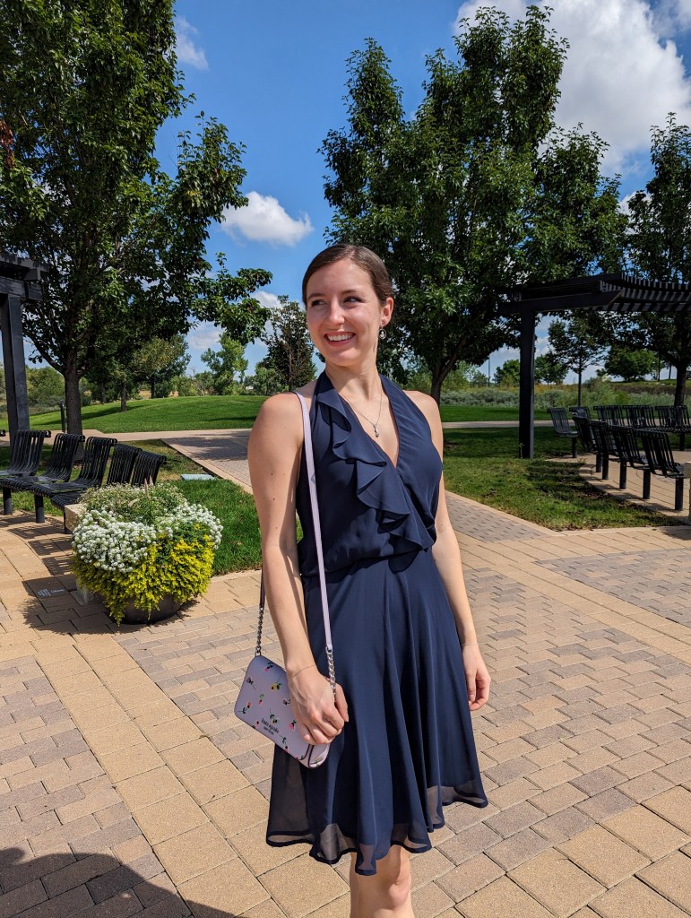 wedding-guest-dress-navy-thrifted-ruffle-dress-kate-spade-purse