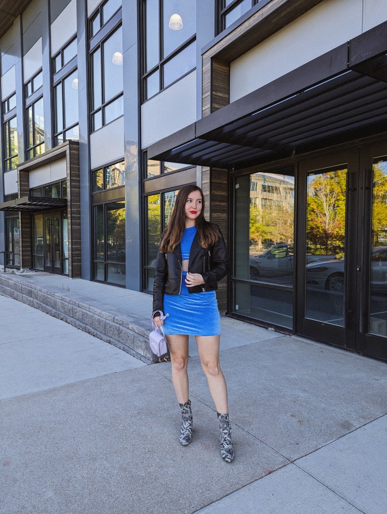 taylor-swift-thrifty-outfit-blue-dress-black-leather-jacket-snakeskin-booties