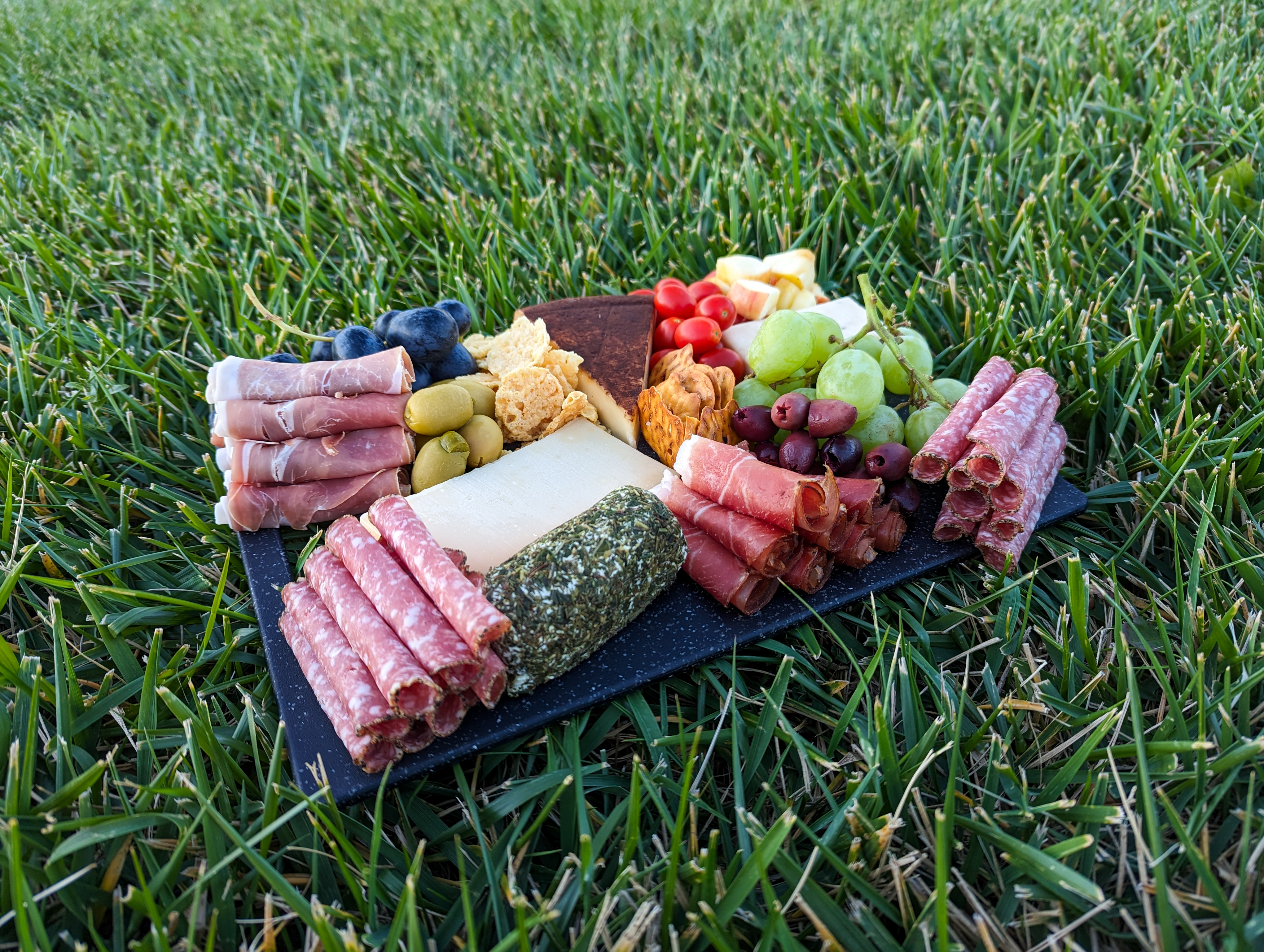 charcuterie-board-fall-picnic-date-night-rolled-meat-goat-cheese-grapes-olives