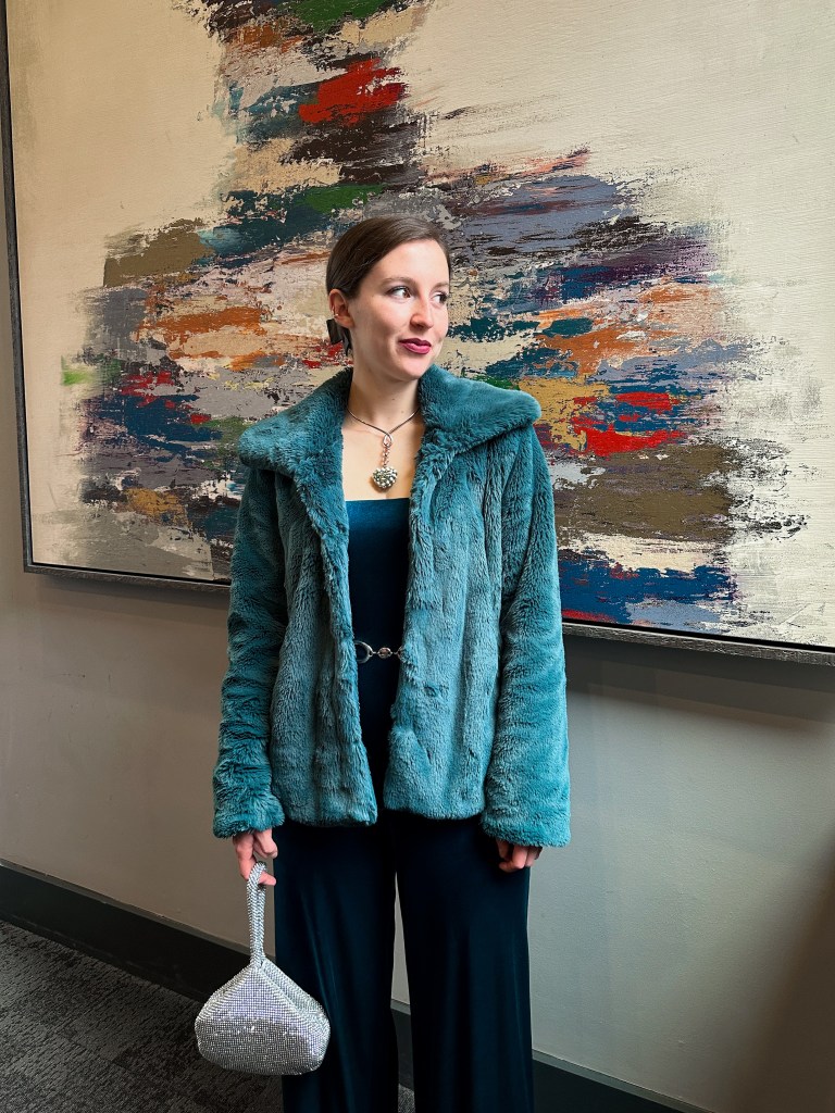 silver-purse-monochrome-teal-outfit-thrifted-style-green-heart-necklace-faux-fur-jacket