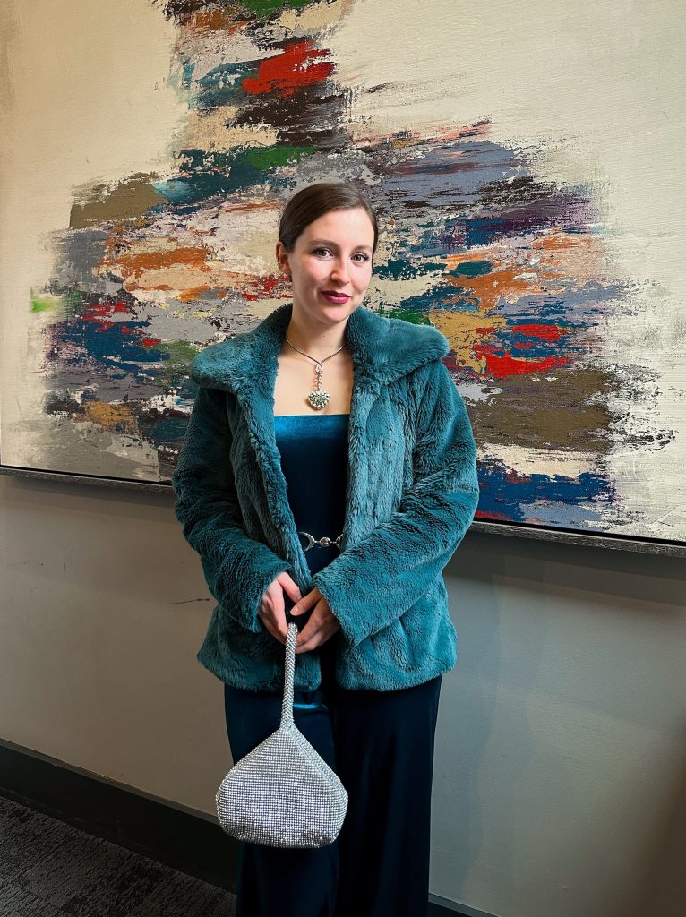 thrifted-fashion-going-out-outfit-teal-faux-fur-jacket-velvet-jumpsuit-silver-purse