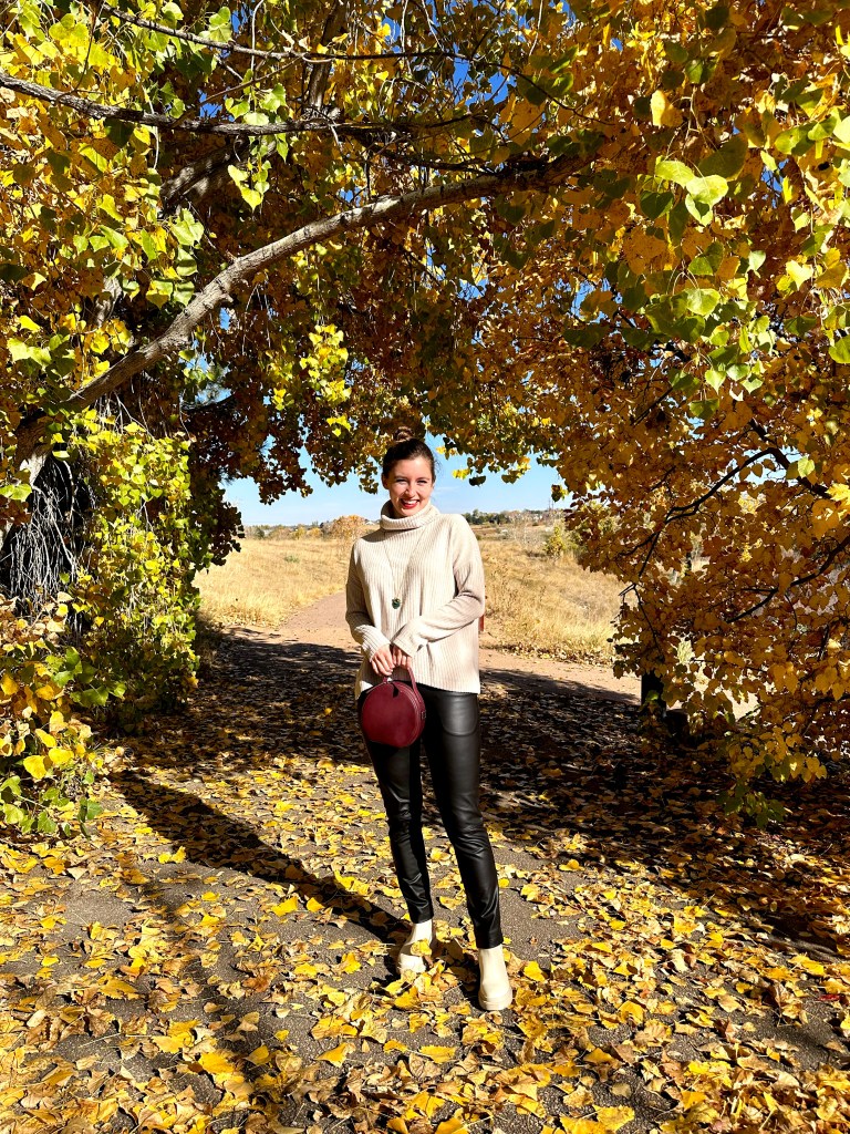 clara-sunwoo-fall-outfit-leather-pants-beige-sweater-leather-boots