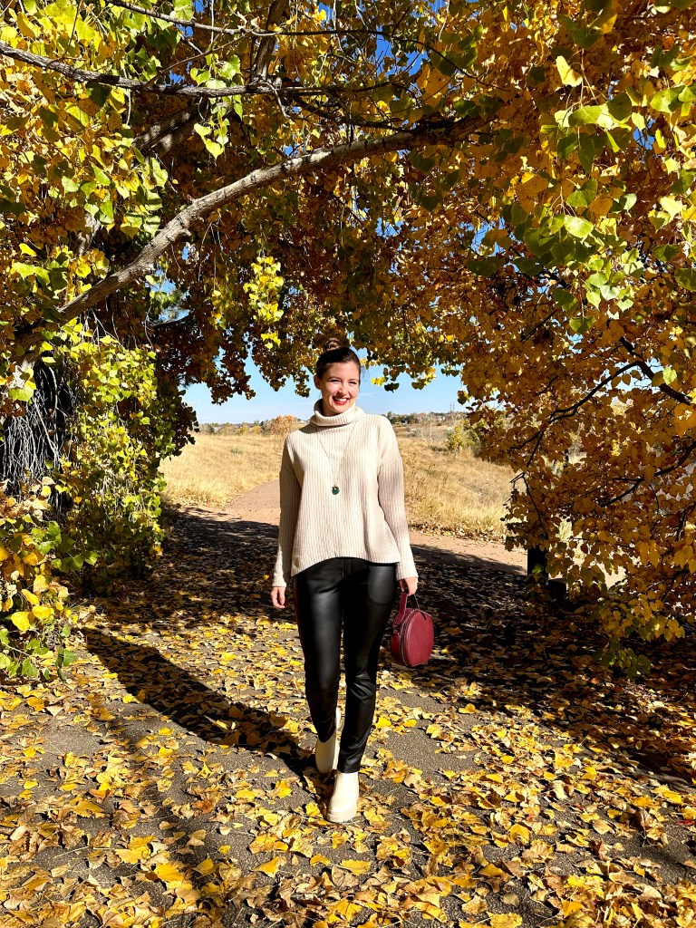 beige-sweater-turtleneck-leather-jackets-circle-purse-maroon