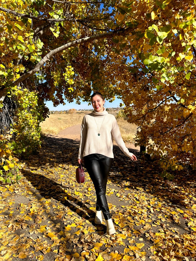 leather-pants-beige-turtleneck-sweater-cream-booties-maroon-circle-purse