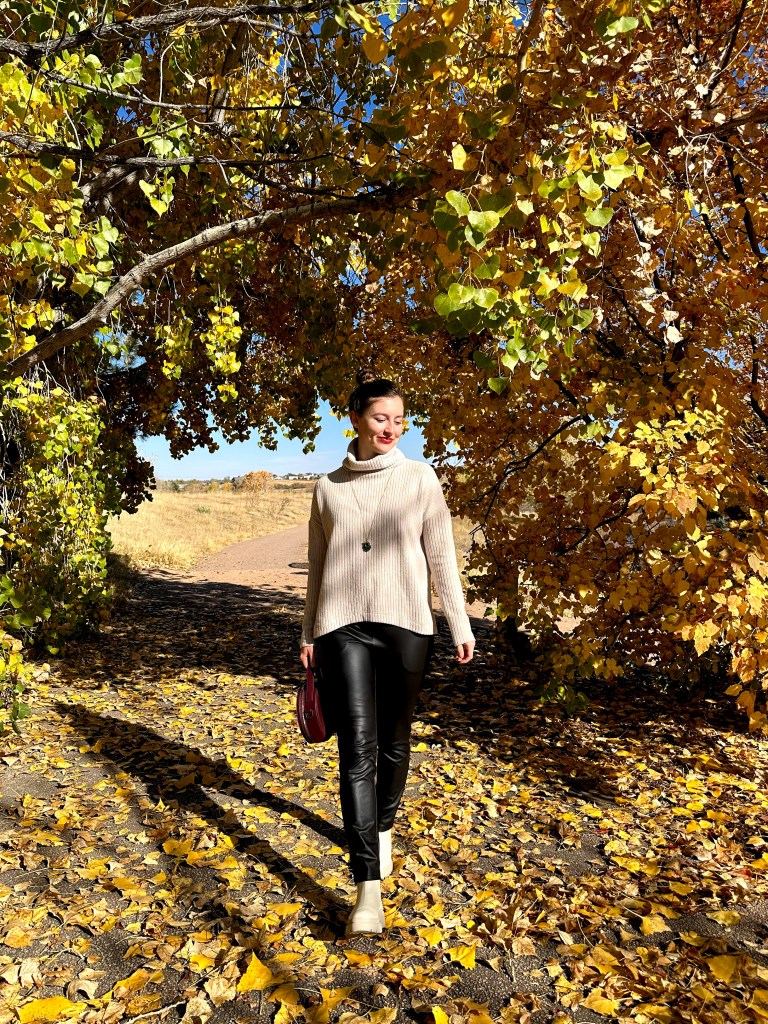 clara-sunwoo-fall-outfit-beige-sweater-black-leather-pants-cream-booties-portland-leather-goods