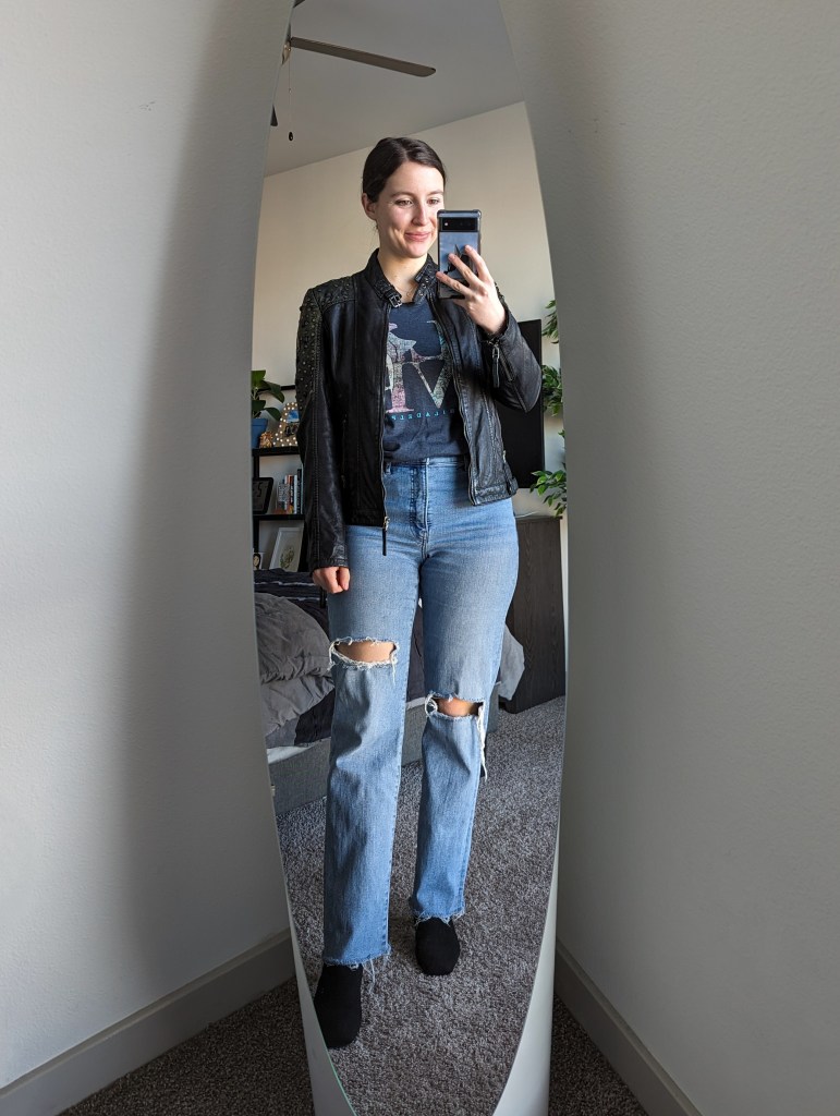 black-leather-jacket-straight-leg-jeans-black-booties-graphic-tee