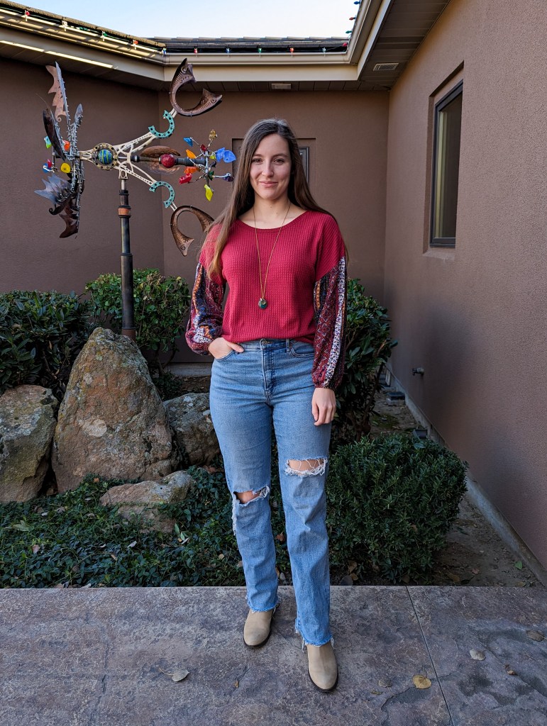 red-patterned-sleeve-top-ripped-straight-leg-jeans-brown-booties