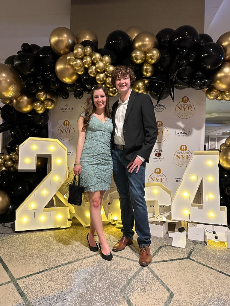 new-years-eve-outfit-sea-green-dress-black-feather-purse-heels