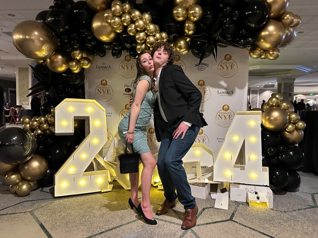 new-years-eve-party-denver-sheraton-hotel-black-heels-feathery-purse