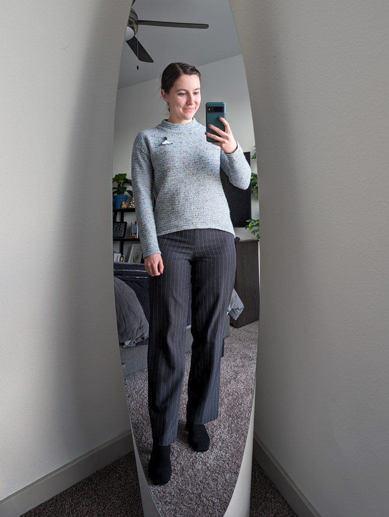 blue-sweater-sundance-pinstripe-trousers-black-vivaia-booties