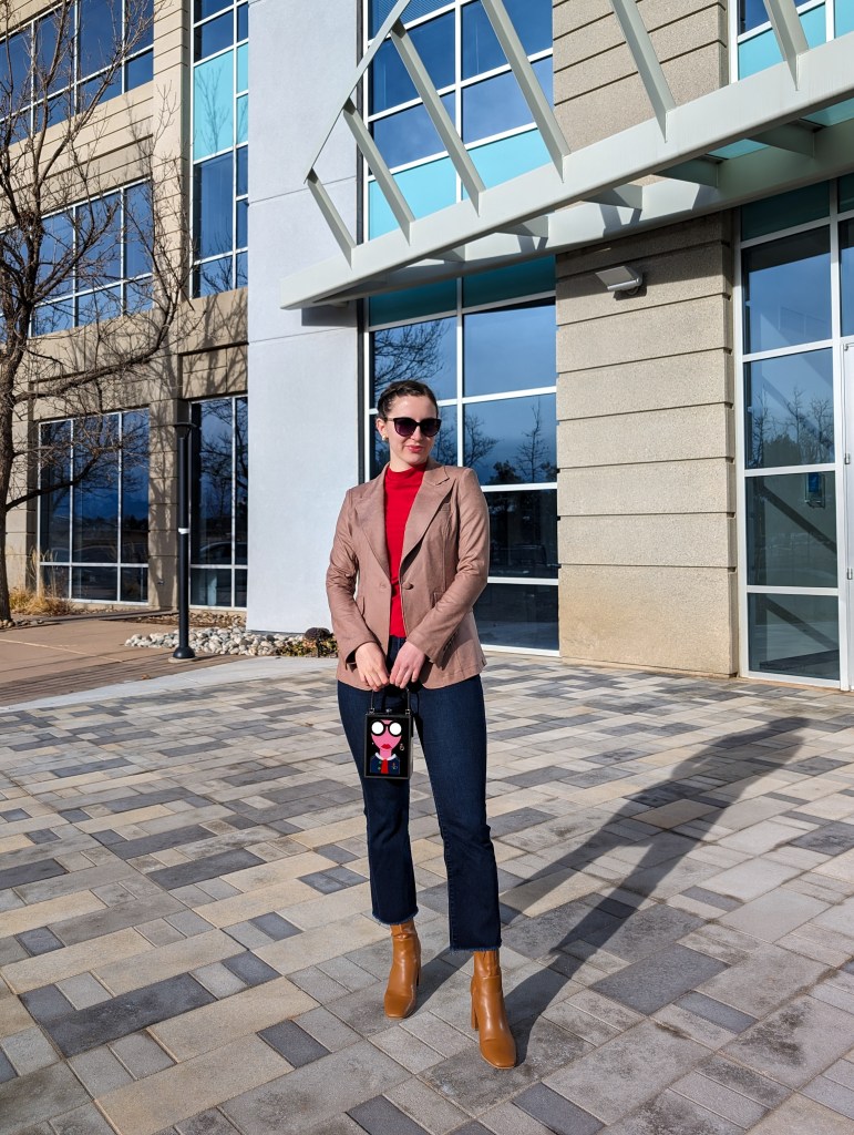 red-blouse-brown-blazer-cropped-flared-jeans-face-purse-clara-sunwoo