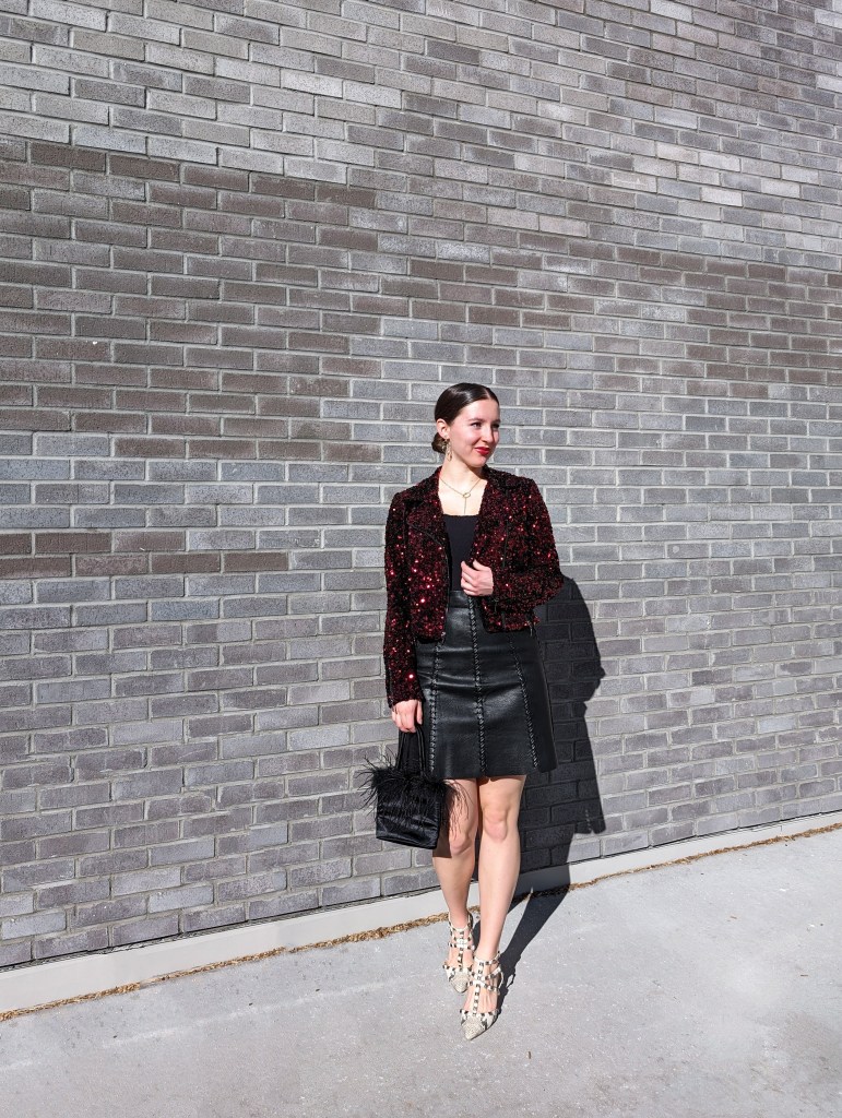 red-sequin-jacket-black-leather-jacket-black-leather-skirt-snakeskin-heels-furry-purse
